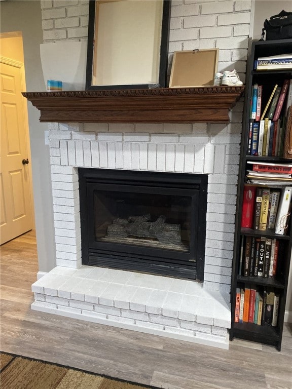 30 Wiggins Ln, South Union Twp, PA 15401 - detailed view of a fireplace and wood finished floors