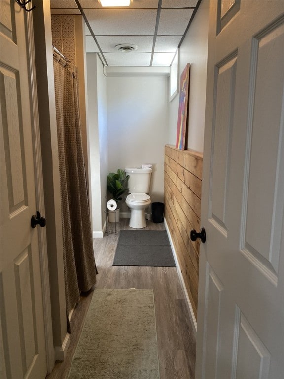 30 Wiggins Ln, South Union Twp, PA 15401 - bathroom featuring toilet, wood finished floors, a paneled ceiling, a shower with curtain, and baseboards