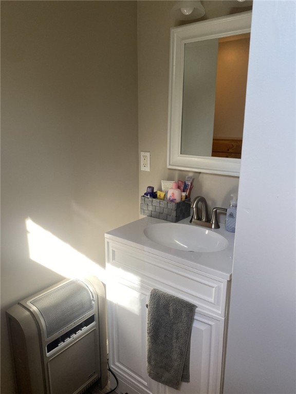 30 Wiggins Ln, South Union Twp, PA 15401 - bathroom with vanity and heating unit
