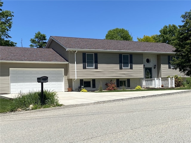30 Wiggins Ln, South Union Twp, PA 15401 - raised ranch featuring driveway and an attached garage