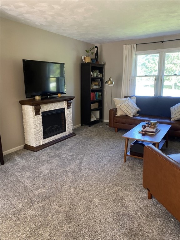 30 Wiggins Ln, South Union Twp, PA 15401 - carpeted living area with a fireplace and baseboards