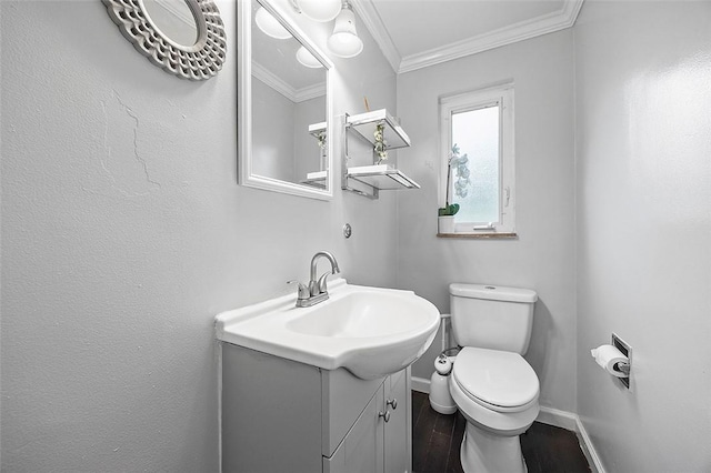 330 Earlwood Rd, Penn Hills, PA 15235 - bathroom with crown molding, baseboards, vanity, toilet, and wood finished floors