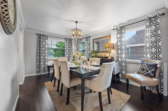 330 Earlwood Rd, Penn Hills, PA 15235 - dining room featuring baseboards, hardwood / wood-style flooring, crown molding, and a chandelier