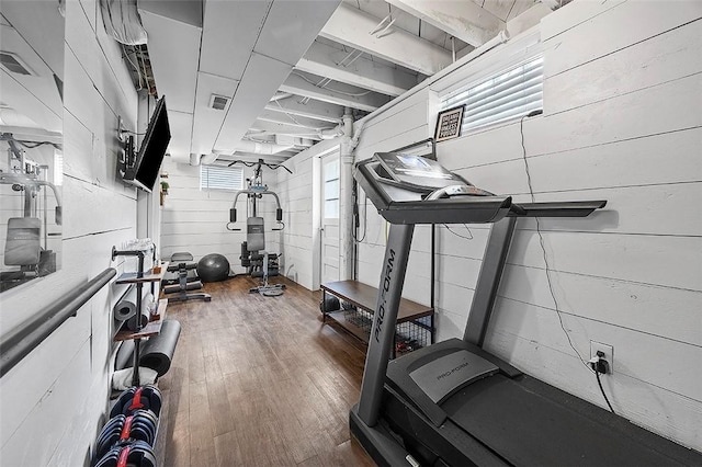 330 Earlwood Rd, Penn Hills, PA 15235 - workout area with wood finished floors and concrete block wall