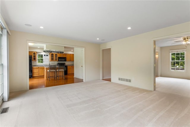 117 Trailside Ct, North Fayette, PA 15108 - unfurnished living room featuring recessed lighting, light carpet, and a ceiling fan