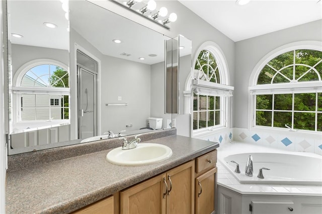117 Trailside Ct, North Fayette, PA 15108 - full bath with vanity, a stall shower, a bath, toilet, and recessed lighting