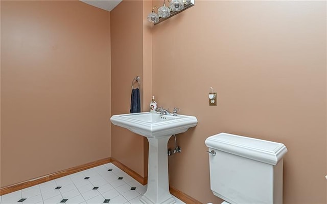 103 Mcdonnell Ln, Middlesex Twp, PA 16002 - bathroom featuring toilet, baseboards, and tile patterned floors