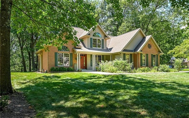 103 Mcdonnell Ln, Middlesex Twp, PA 16002 - traditional-style house featuring a front lawn and brick siding