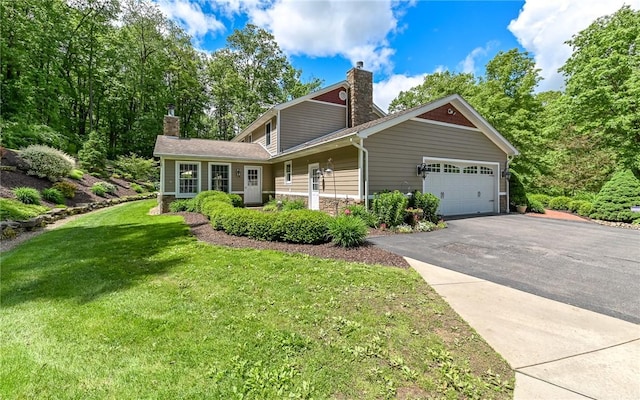 133 Miller Rd, Clinton Twp, PA 16055 - view of front facade with a chimney, a garage, a front lawn, asphalt driveway, and stone siding