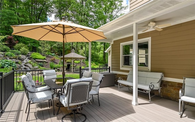 133 Miller Rd, Clinton Twp, PA 16055 - deck featuring a gazebo, outdoor dining area, ceiling fan, and view of scattered trees
