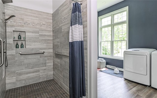 133 Miller Rd, Clinton Twp, PA 16055 - full bathroom featuring washing machine and clothes dryer, tiled shower, and healthy amount of natural light