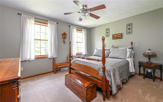 133 Miller Rd, Clinton Twp, PA 16055 - carpeted bedroom featuring a textured ceiling, baseboards, and ceiling fan