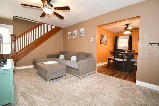 1312 Kelton Ave, Dormont, PA 15216 - living room featuring ceiling fan, carpet floors, stairway, and baseboards
