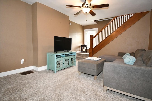 1312 Kelton Ave, Dormont, PA 15216 - living area featuring a ceiling fan, stairs, light carpet, and baseboards