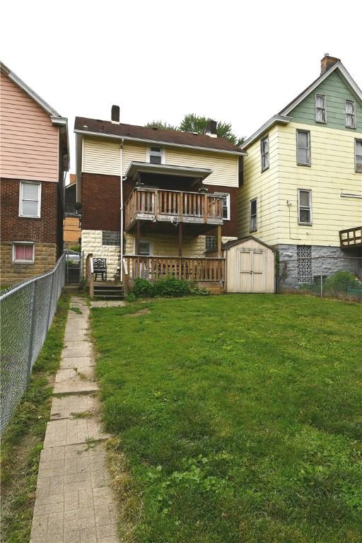 1312 Kelton Ave, Dormont, PA 15216 - back of house featuring a wooden deck and a chimney