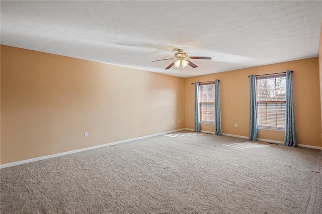 115 Tartan Dr, Hempfield Twp Wml, PA 15601 - carpeted empty room featuring ceiling fan, a textured ceiling, and baseboards