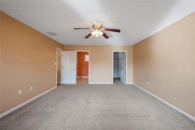 115 Tartan Dr, Hempfield Twp Wml, PA 15601 - unfurnished bedroom featuring a spacious closet, baseboards, and carpet
