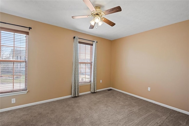 115 Tartan Dr, Hempfield Twp Wml, PA 15601 - empty room featuring ceiling fan, baseboards, and carpet flooring