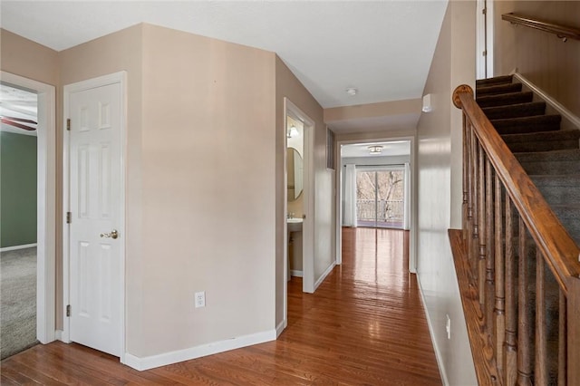 115 Tartan Dr, Hempfield Twp Wml, PA 15601 - hall with wood finished floors, baseboards, and stairway