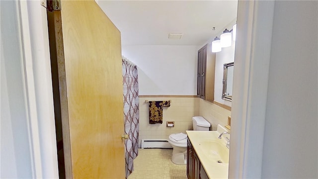 122 Burke Dr, Monroeville, PA 15146 - full bath featuring a baseboard radiator, toilet, vanity, wainscoting, and a shower with shower curtain