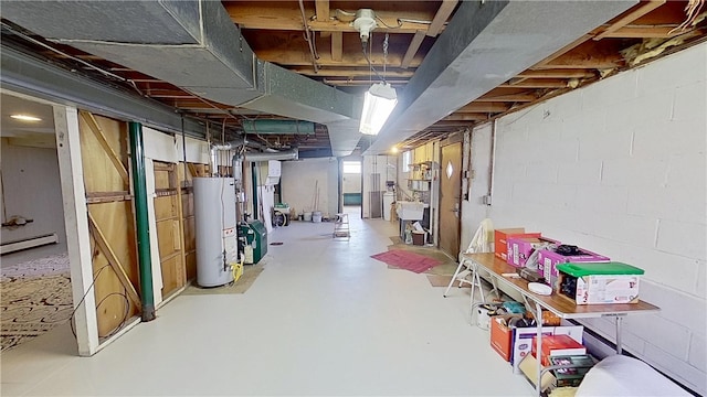 122 Burke Dr, Monroeville, PA 15146 - unfinished below grade area with gas water heater and a baseboard heating unit