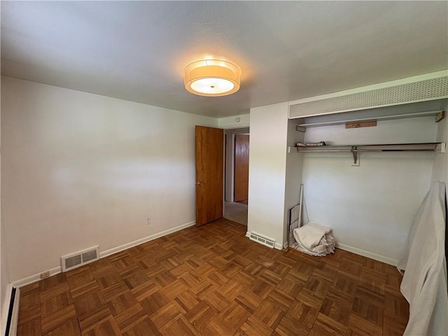 122 Burke Dr, Monroeville, PA 15146 - unfurnished bedroom featuring baseboards, a closet, and baseboard heating