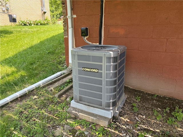 122 Burke Dr, Monroeville, PA 15146 - exterior view of central air condition unit and concrete block siding