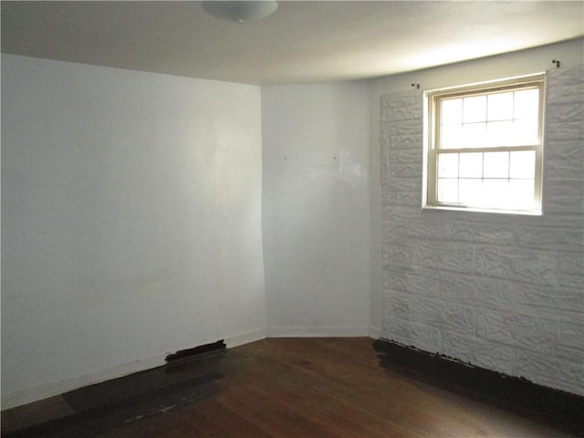 14051407 Brownsville Rd, Carrick, PA 15210 - spare room with wood finished floors and baseboards