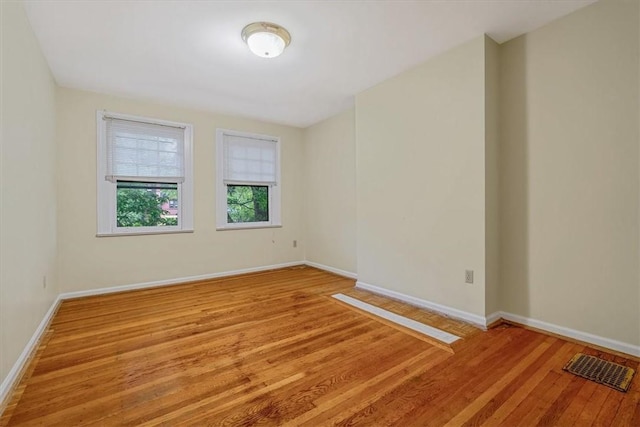 1167 Murray Hill Ave, Squirrel Hill, PA 15217 - empty room with wood finished floors and baseboards