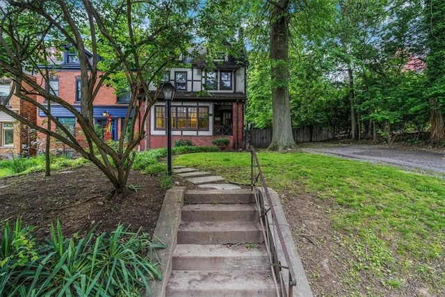 1167 Murray Hill Ave, Squirrel Hill, PA 15217 - tudor-style house featuring brick siding and stairway