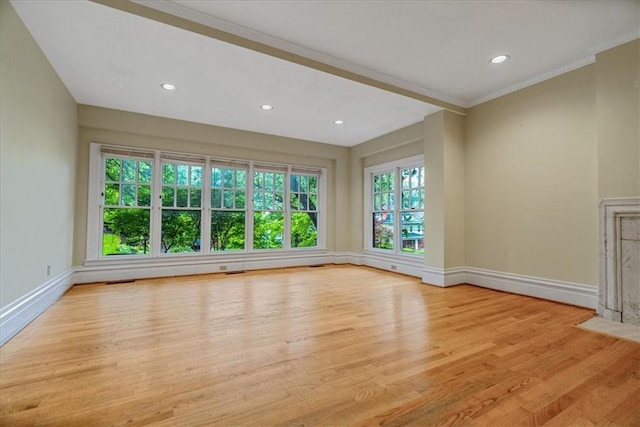 1167 Murray Hill Ave, Squirrel Hill, PA 15217 - unfurnished living room with baseboards, light wood-style flooring, recessed lighting, and crown molding