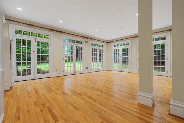 1167 Murray Hill Ave, Squirrel Hill, PA 15217 - unfurnished living room featuring light wood-style flooring, french doors, recessed lighting, and baseboards