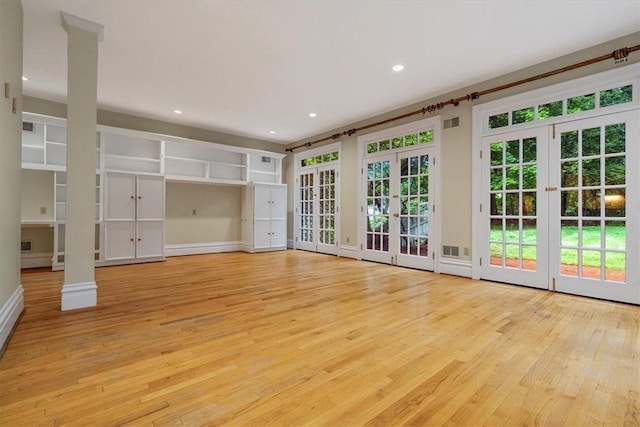 1167 Murray Hill Ave, Squirrel Hill, PA 15217 - unfurnished living room with light wood-style floors, french doors, baseboards, and recessed lighting