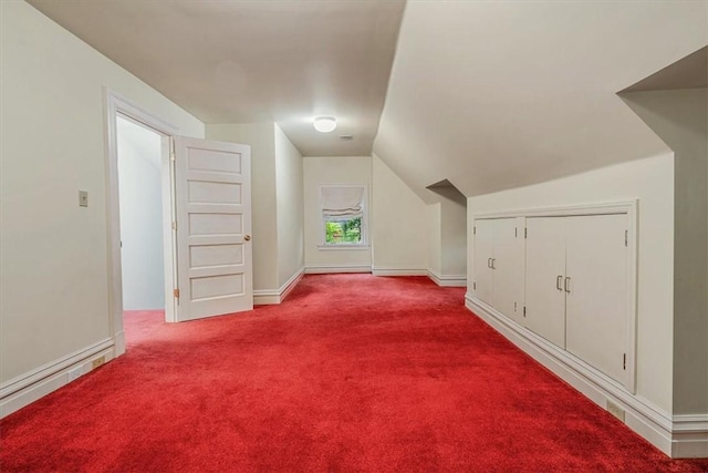 1167 Murray Hill Ave, Squirrel Hill, PA 15217 - additional living space featuring dark colored carpet, vaulted ceiling, and baseboards