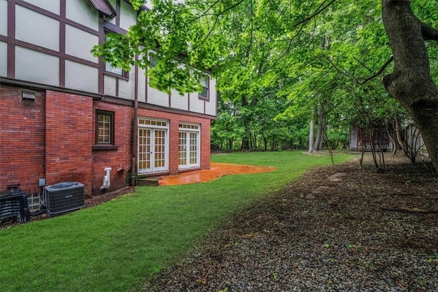 1167 Murray Hill Ave, Squirrel Hill, PA 15217 - view of grassy yard featuring central air condition unit and french doors