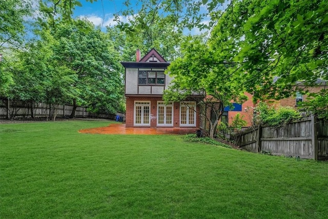1167 Murray Hill Ave, Squirrel Hill, PA 15217 - rear view of property featuring french doors, a chimney, and brick siding