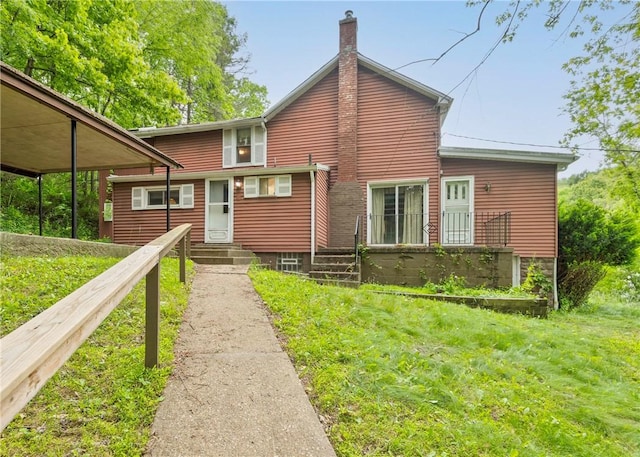 2555 Cole Rd, Marshall, PA 15090 - rear view of house with a chimney and a lawn