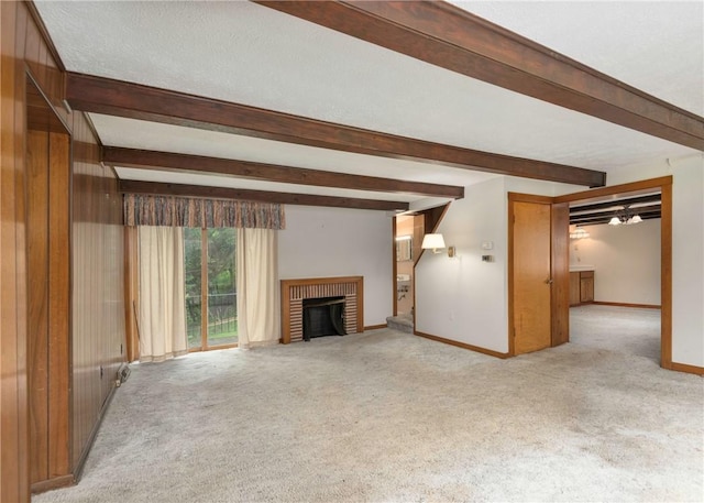 2555 Cole Rd, Marshall, PA 15090 - unfurnished living room with beamed ceiling, carpet, baseboards, and a brick fireplace