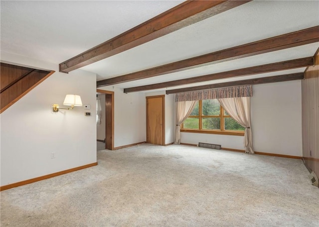 2555 Cole Rd, Marshall, PA 15090 - unfurnished living room featuring light colored carpet, baseboards, and beam ceiling