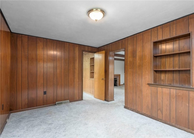 2555 Cole Rd, Marshall, PA 15090 - carpeted empty room featuring wooden walls and built in features