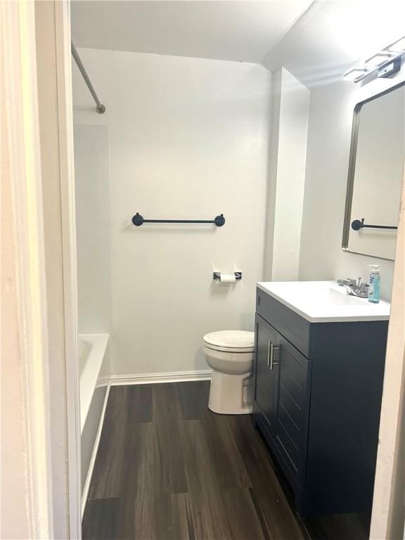 7 Fairview Pl, Union Twp Wsh, PA 15038 - bathroom with vanity, toilet, wood finished floors, baseboards, and tub / shower combination