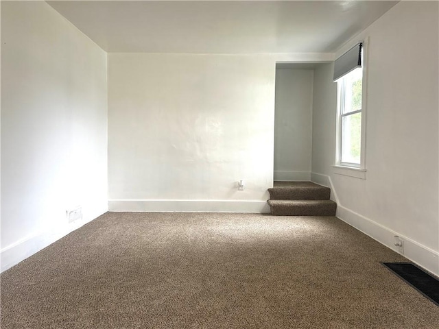 7 Fairview Pl, Union Twp Wsh, PA 15038 - empty room with carpet floors, stairway, and baseboards