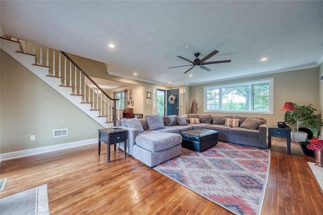 190 Ridge Ave, Mccandless, PA 15237 - living area featuring wood finished floors, stairway, ornamental molding, ceiling fan, and baseboards