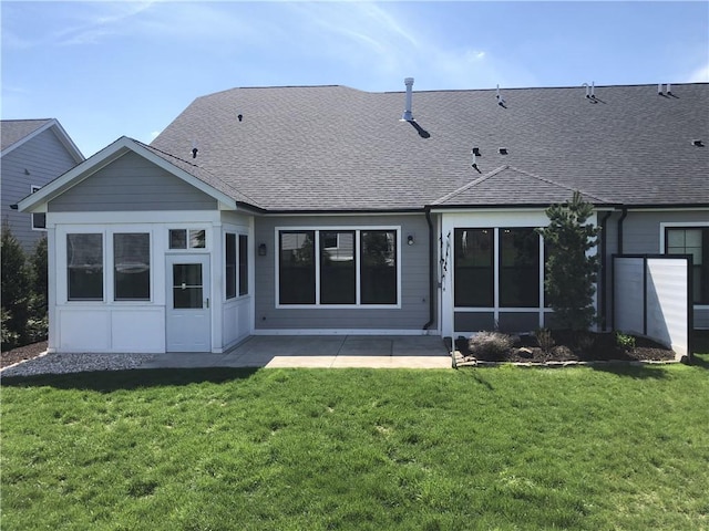 1006 Sweetgum Ct, Penn Twp Wml, PA 15644 - back of house featuring roof with shingles, a yard, and a patio