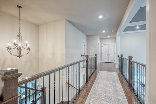 1703 Stevensan, Franklin Park, PA 15143 - hall featuring wood finished floors, a chandelier, recessed lighting, an upstairs landing, and baseboards