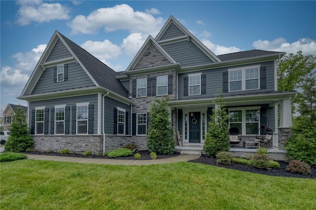 1703 Stevensan, Franklin Park, PA 15143 - craftsman inspired home featuring stone siding, a front lawn, and covered porch