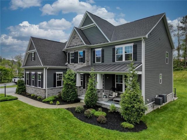 1703 Stevensan, Franklin Park, PA 15143 - craftsman inspired home featuring a porch, a standing seam roof, stone siding, a shingled roof, and a front yard