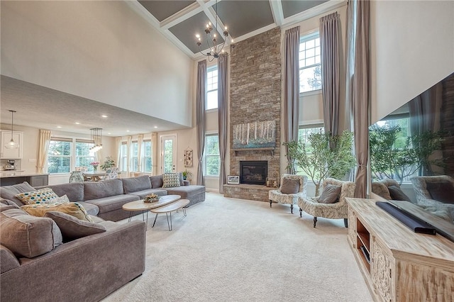 1703 Stevensan, Franklin Park, PA 15143 - living area featuring ornamental molding, carpet floors, healthy amount of natural light, a high ceiling, and a stone fireplace