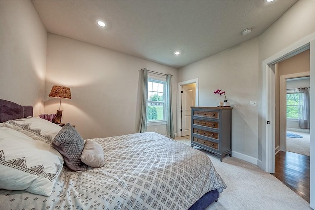 1703 Stevensan, Franklin Park, PA 15143 - bedroom with multiple windows, light colored carpet, recessed lighting, and baseboards