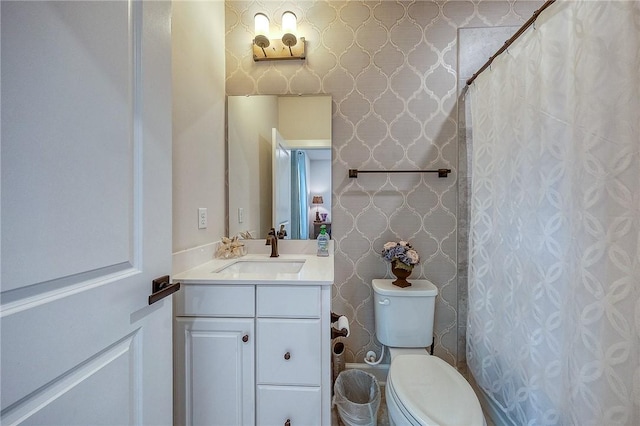 1703 Stevensan, Franklin Park, PA 15143 - bathroom featuring vanity, toilet, curtained shower, and wallpapered walls